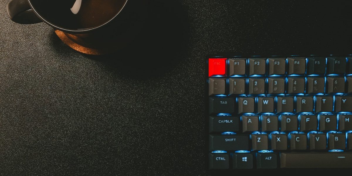 coffee cup and keyboard